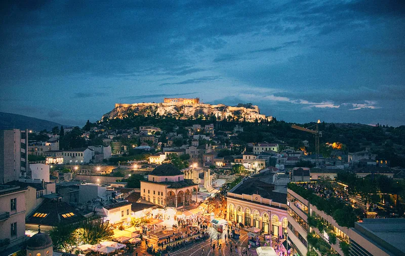 Athens by night with illuminated Acropolis